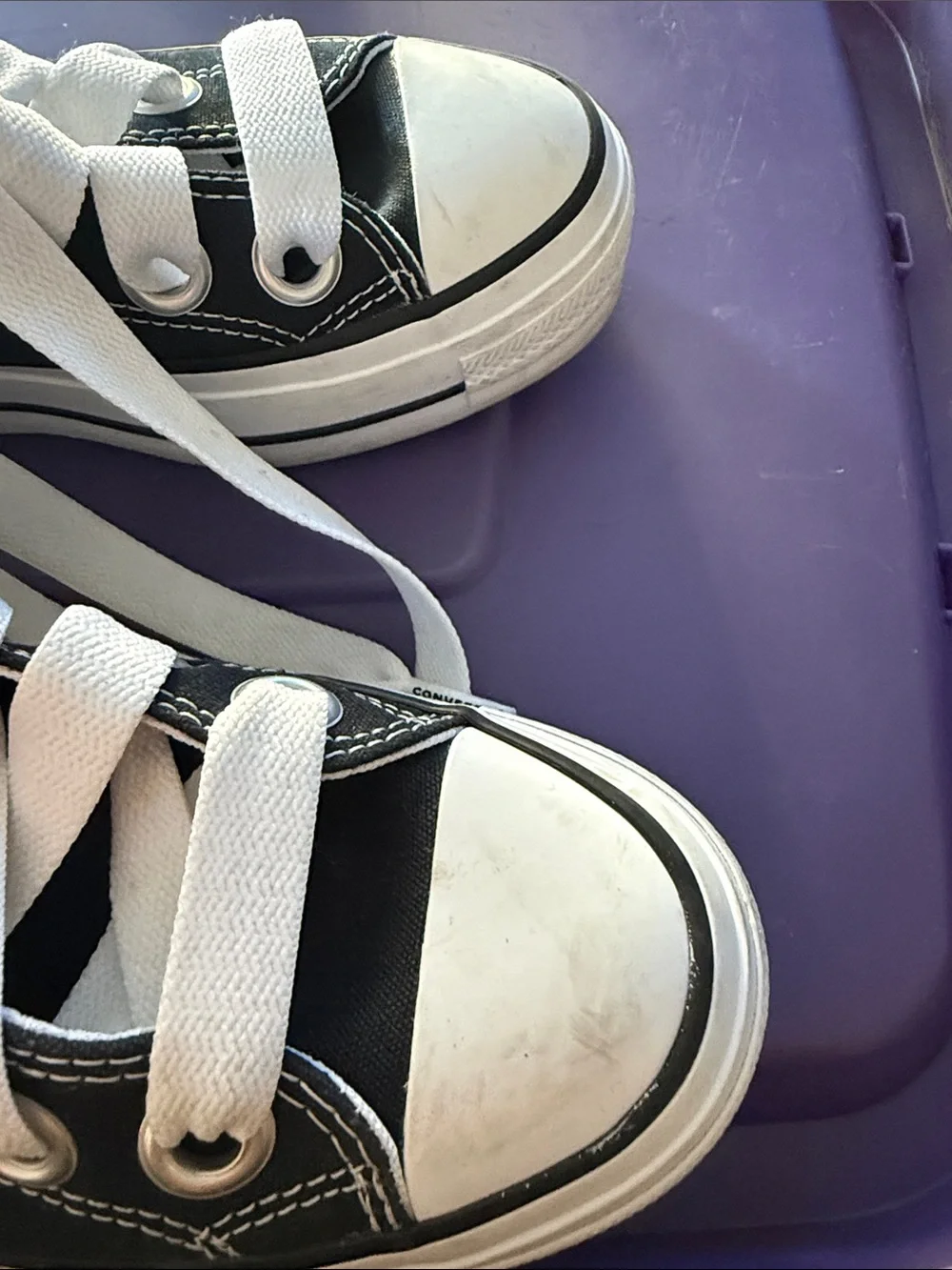 Converse women’s Black and White High-Top Sneakers